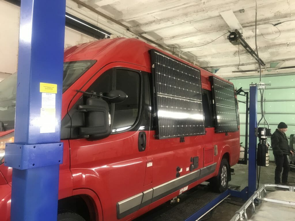 Rust proofing for a motor home - red with solar panels